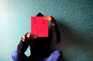 head covered by paper bag