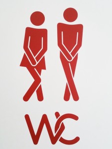 sign depicting need for toilet