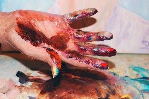 hand covered in paint